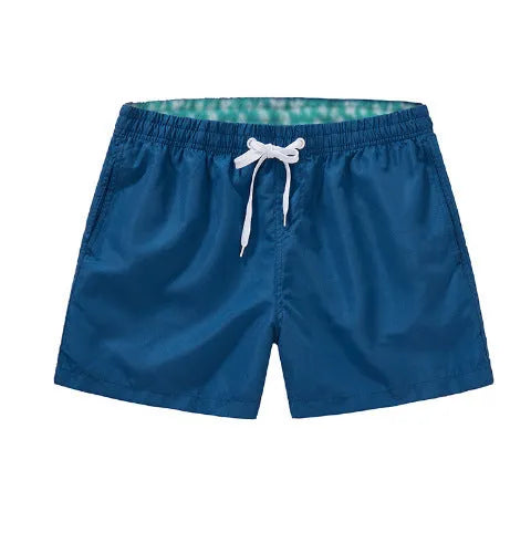 Men's straight leg beach shorts in polyester fabric available in multiple colours and sizes S to 4XL