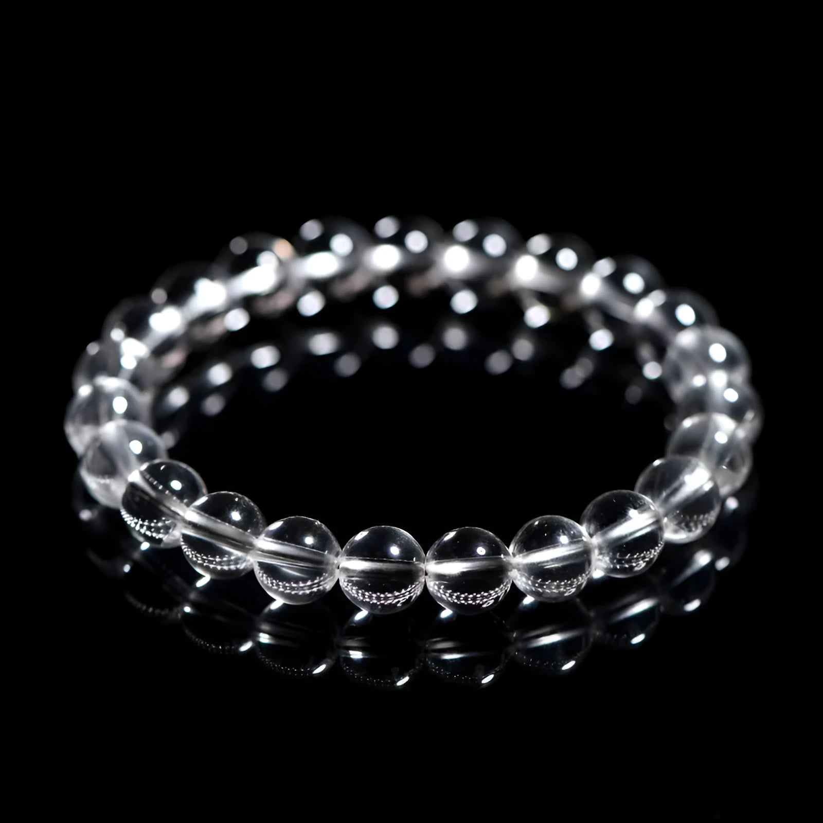 Natural Donghai crystal bracelet with round white beads, shown in a single circle design.