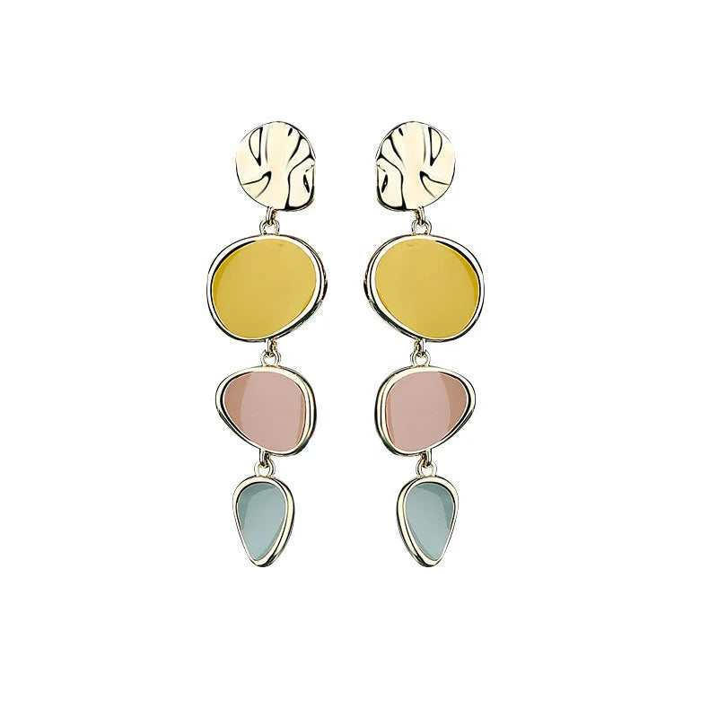 A pair of disc-shaped alloy earrings with a Morandi three-colour dripping oil finish on a sterling silver needle post.