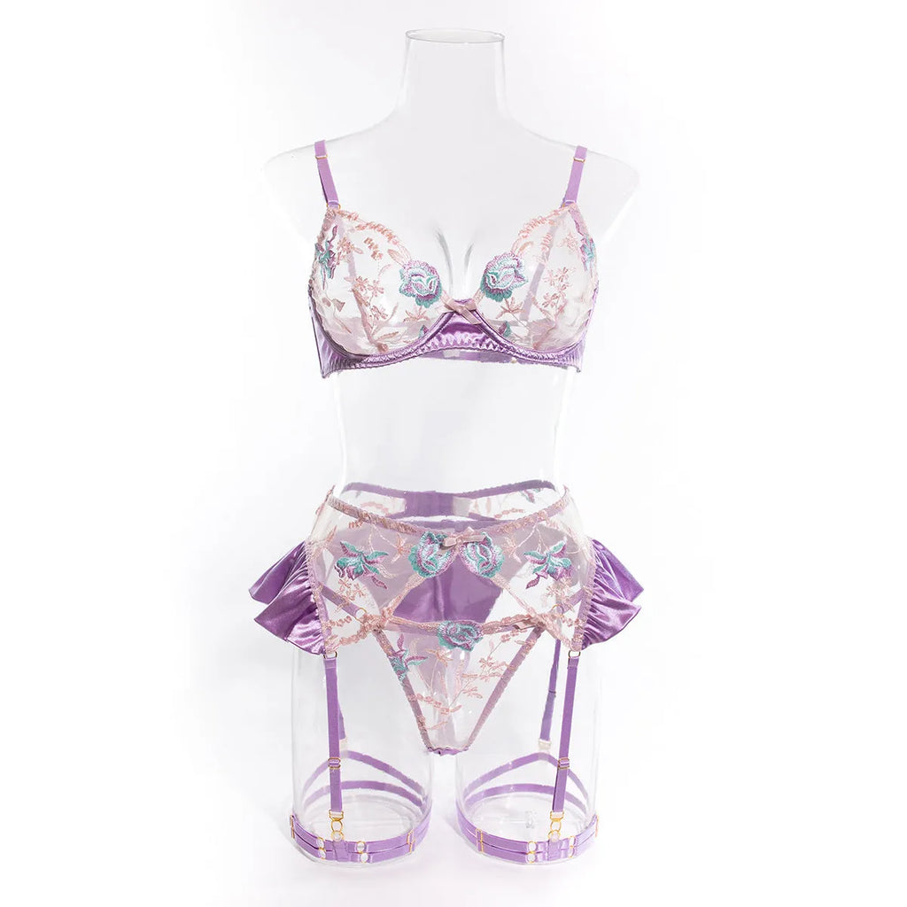 Light purple satin lingerie four-piece set with embroidery details on mercedized fabric