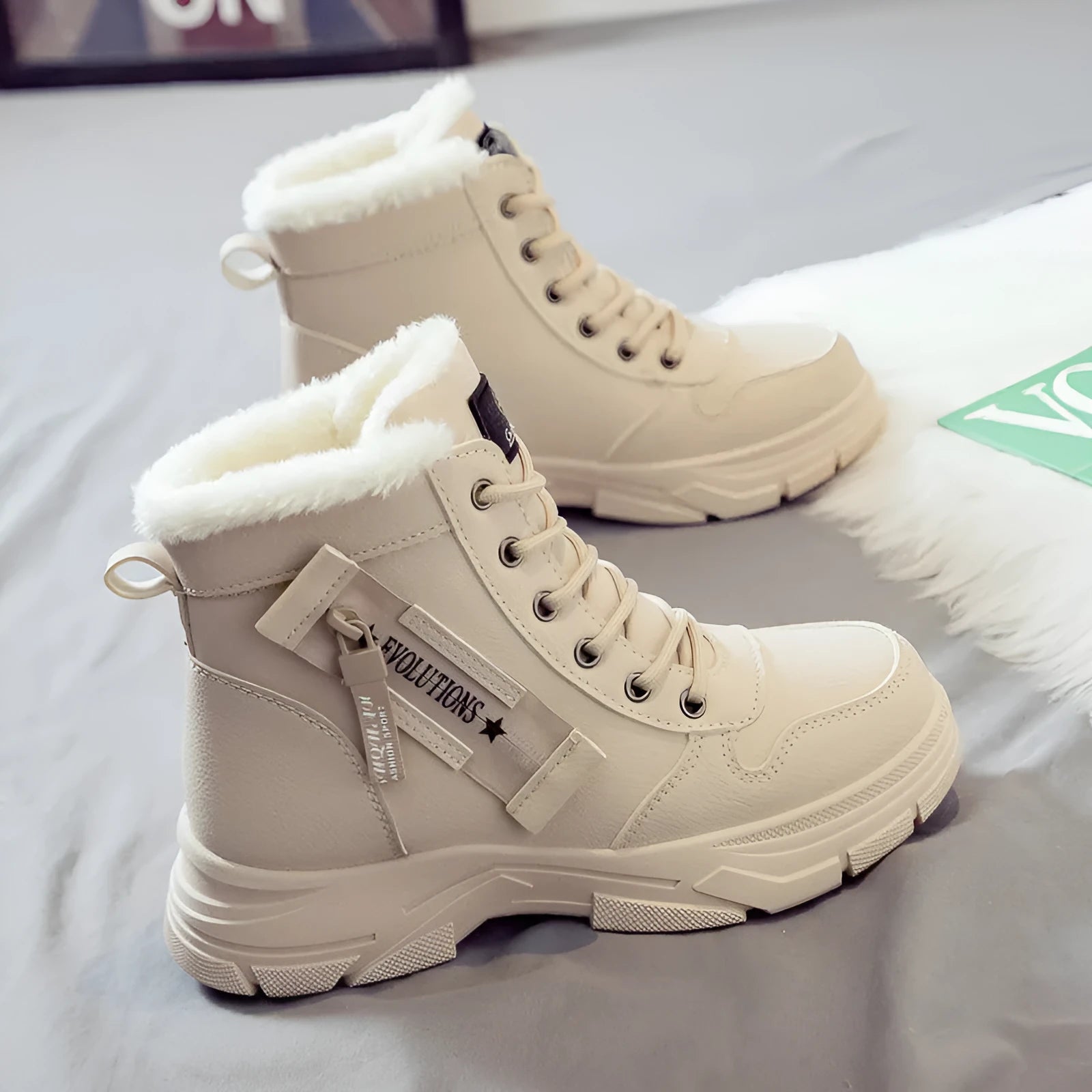 Women's plus size tall black snow boot with velvet lining and lace-up front on a rubber sole.