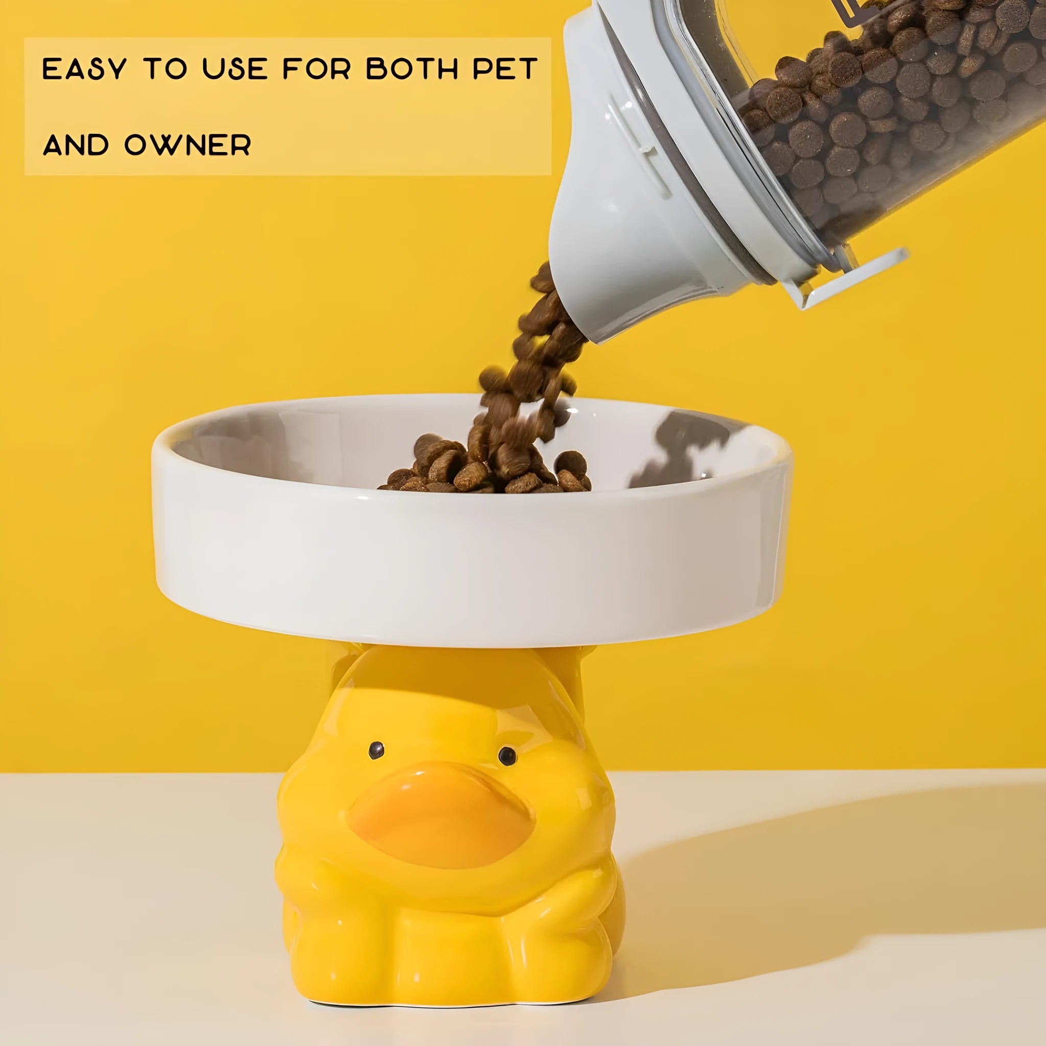 Raised ceramic cat bowl in animal design with wide opening for whisker-friendly feeding