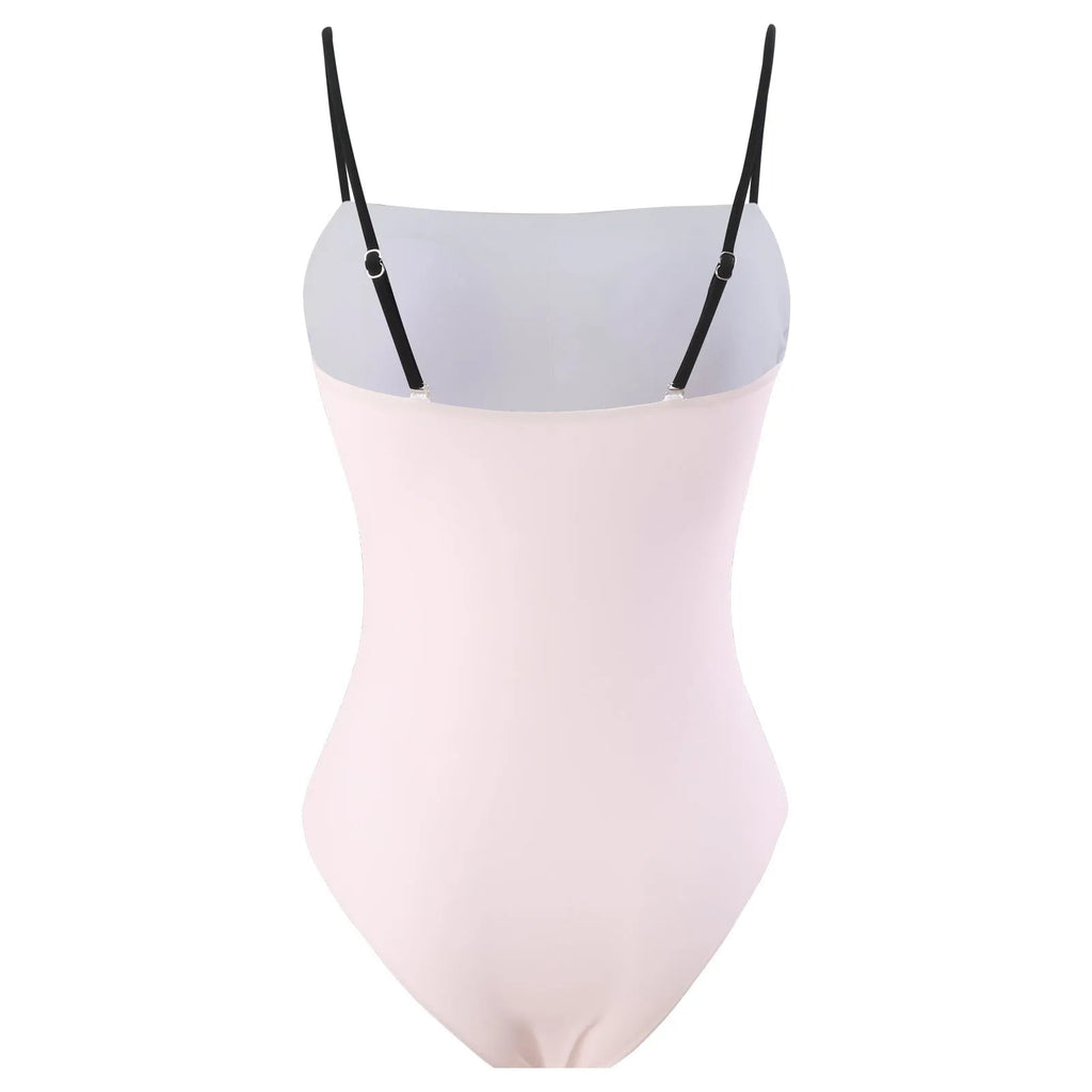 Patterned women's two-piece bikini swimsuit with a light tulle skirt.