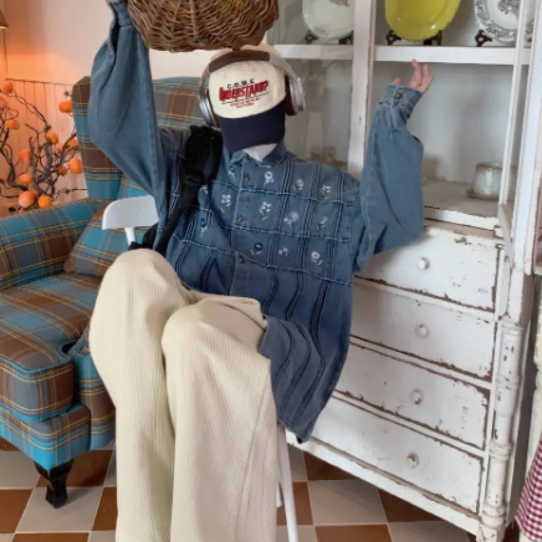 Vintage washed blue denim shirt with floral pleated detailing and long sleeves