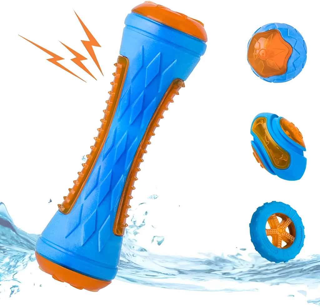 Set of three dog toys: a red ball, a blue barbell, and an orange tyre, floating in water.
