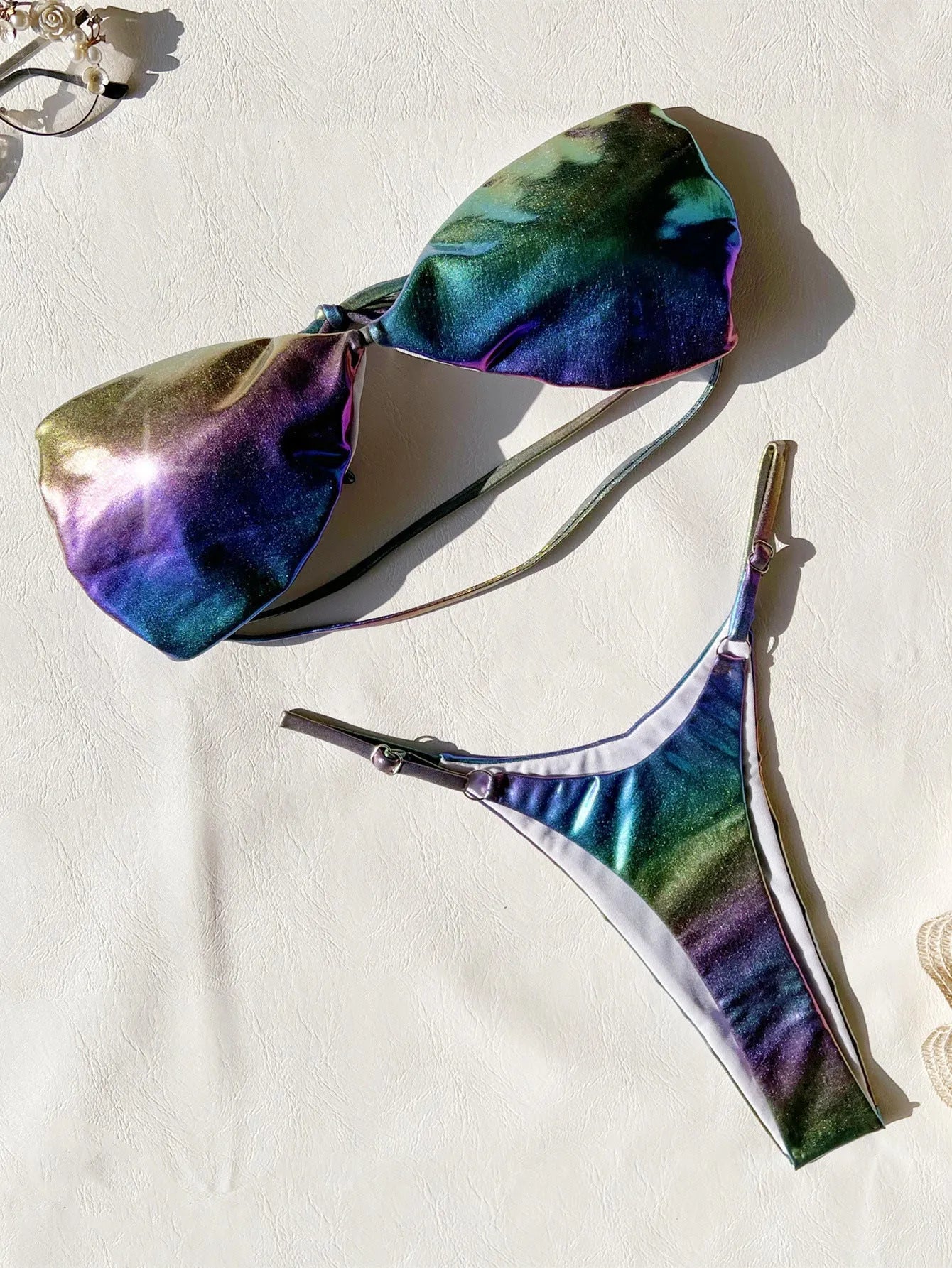 Women's gradient purple bikini swimsuit set on a mannequin.