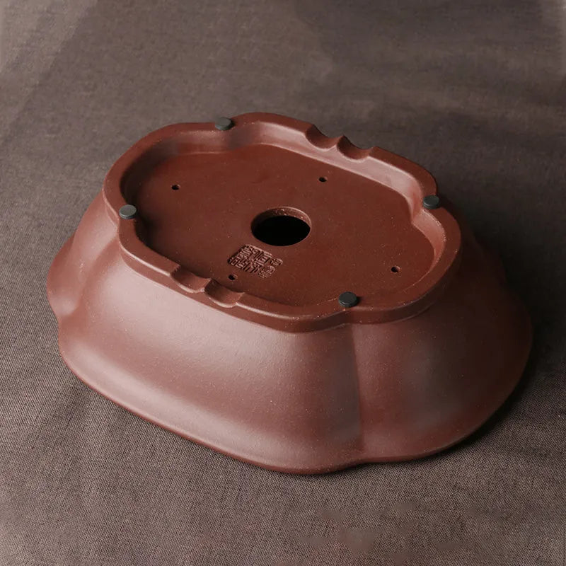 Handmade purple clay bonsai basin measuring 25x20x7 cm with classical Chinese design