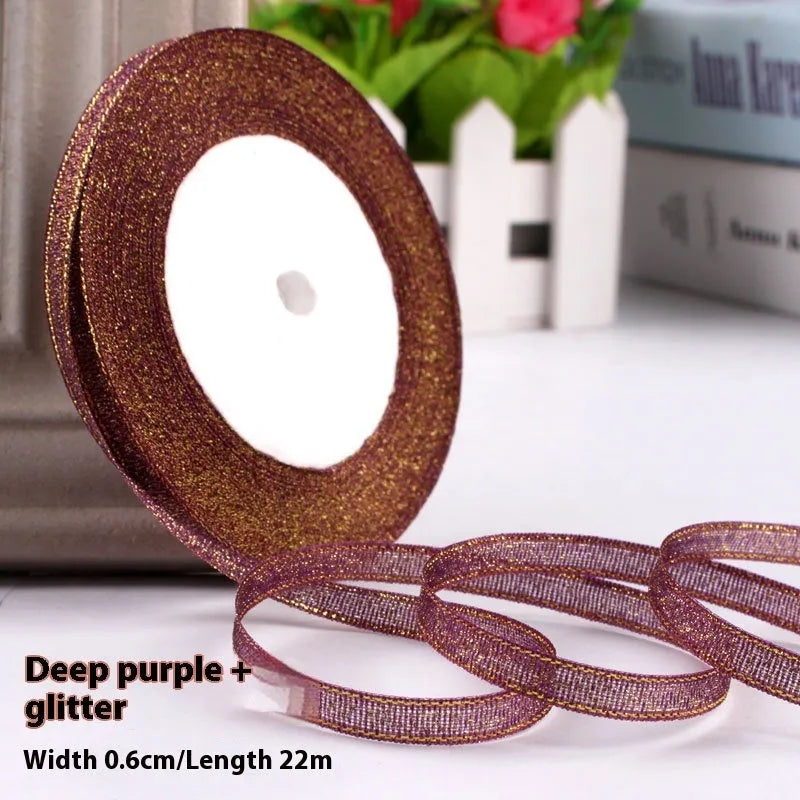 Roll of narrow 0.6cm wide polyester satin ribbon in a choice of colours, showing 22 metre length.