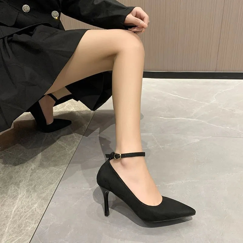 Women's black stiletto heel pump shoes with buckle detail and 8cm heel height