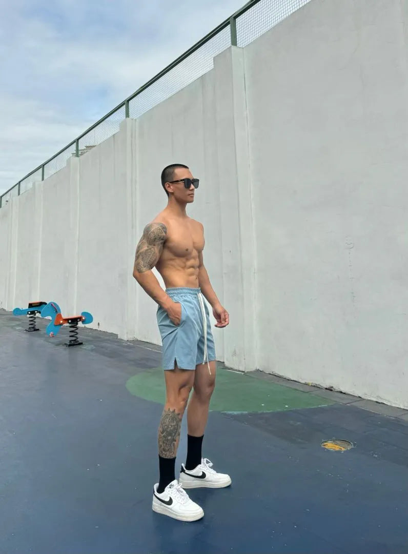 Men's ice silk quick-drying shorts in casual double-layer design