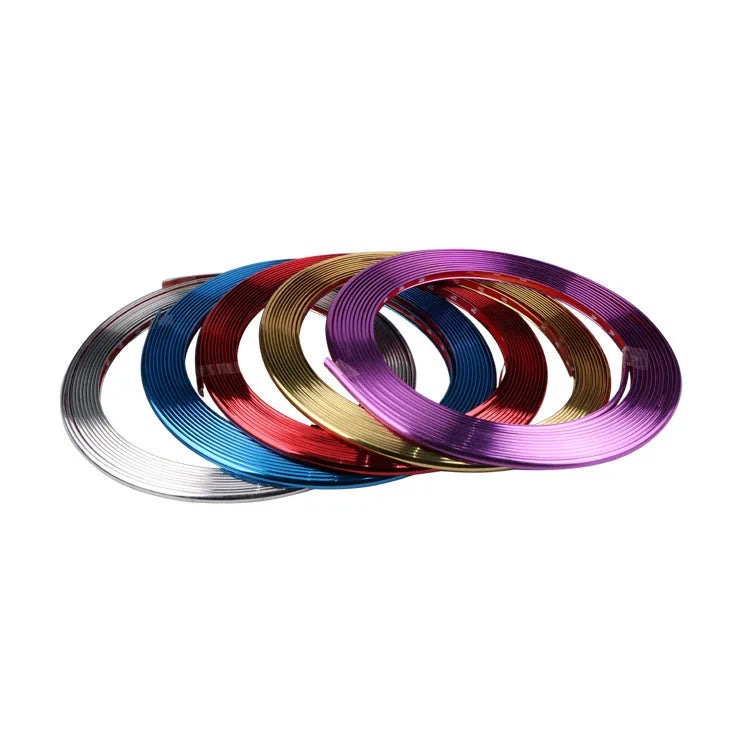 Roll of electroplated purple PVC wheel rim trim sticker, 10mm wide.