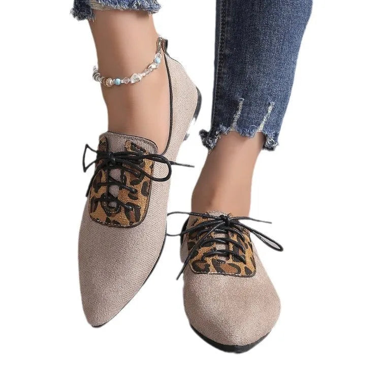Beige leopard print women's pumps with pointed toe design and rubber sole