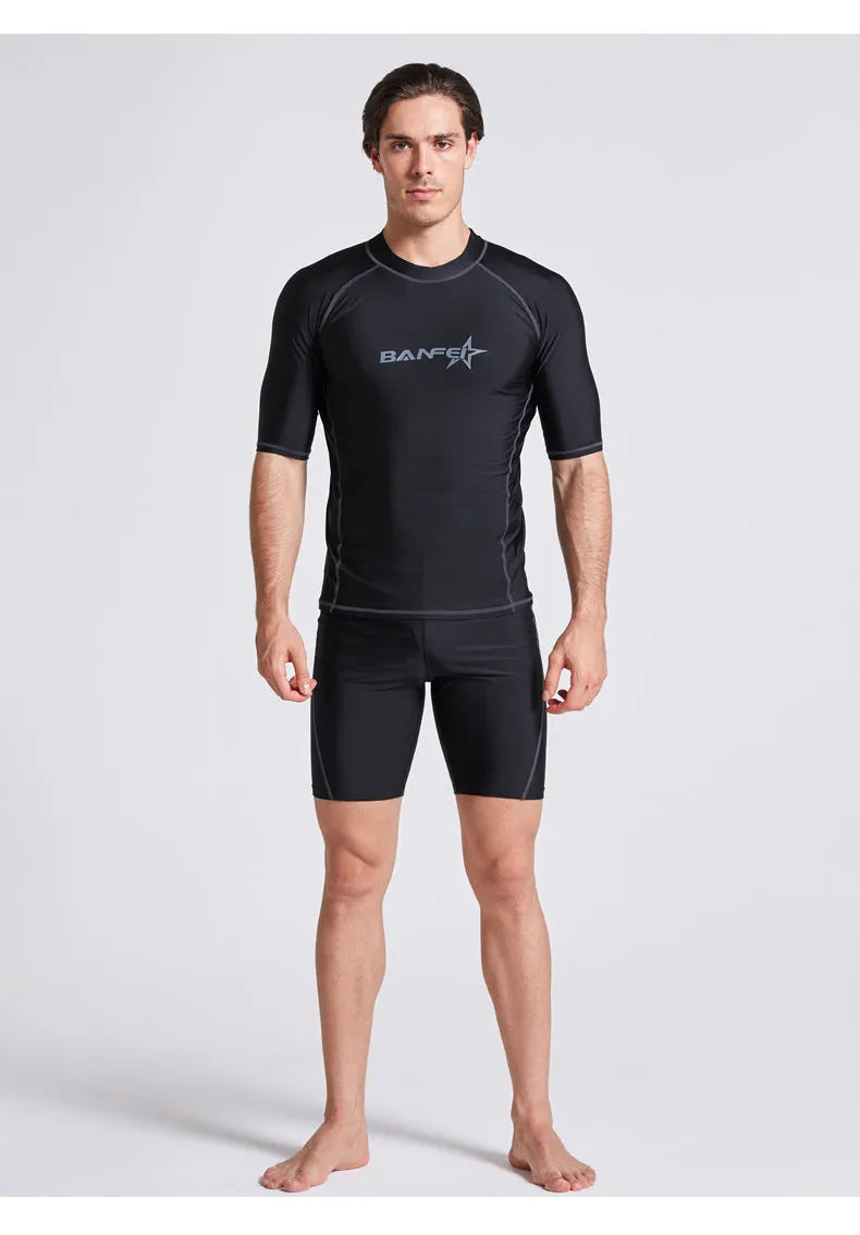 Men's navy blue half sleeve swimsuit top and pants set for swimming