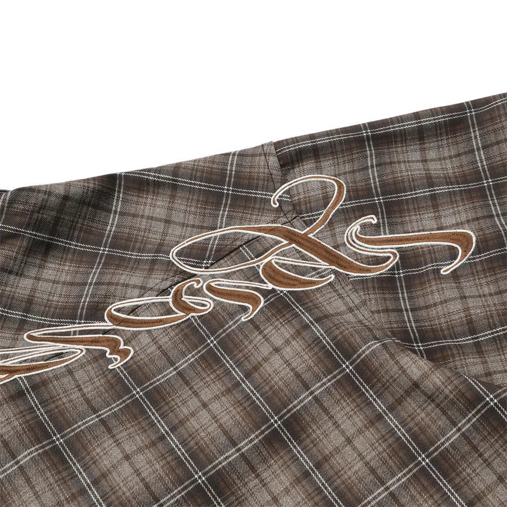 Men's black plaid shirt with embroidered letter design on chest, short sleeves, and lapel collar