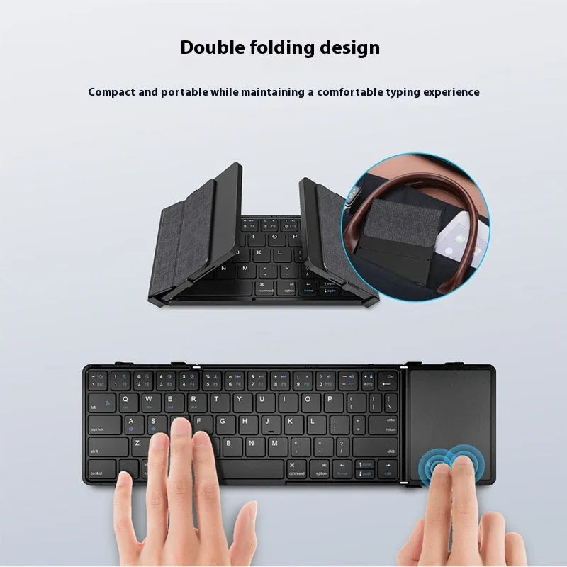 Black folding Bluetooth keyboard collapsed to compact size for mobile phones and tablets