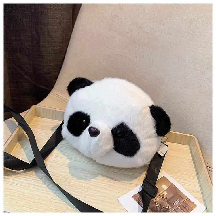 Plush cylindrical crossbody bag with panda design, showing sandwich pocket and shoulder strap