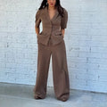 Brown polyester men's slim fit suit with long sleeve top and matching trousers