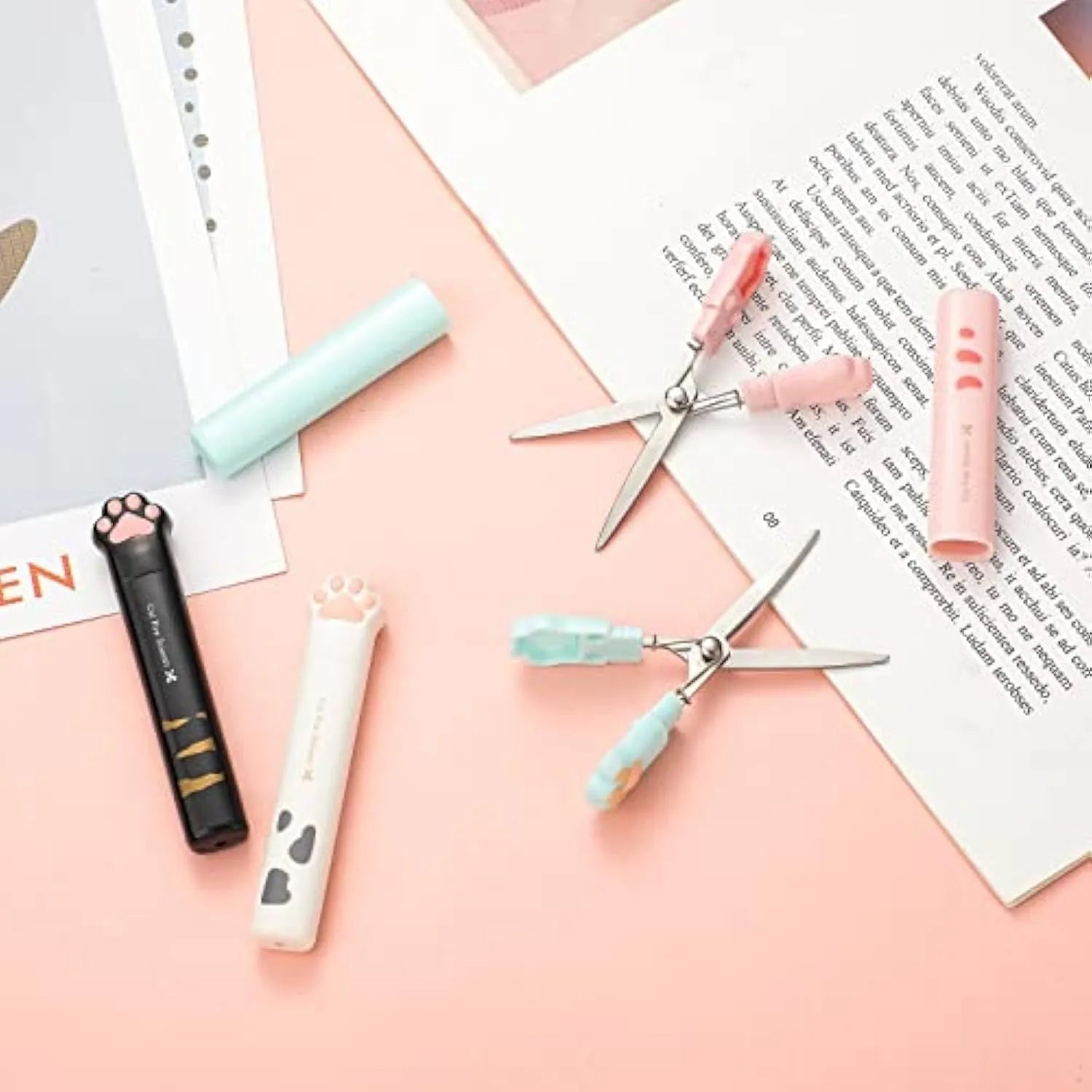 Cat paw mini folding scissors in four colours with stainless steel blades measuring 8.7 cm