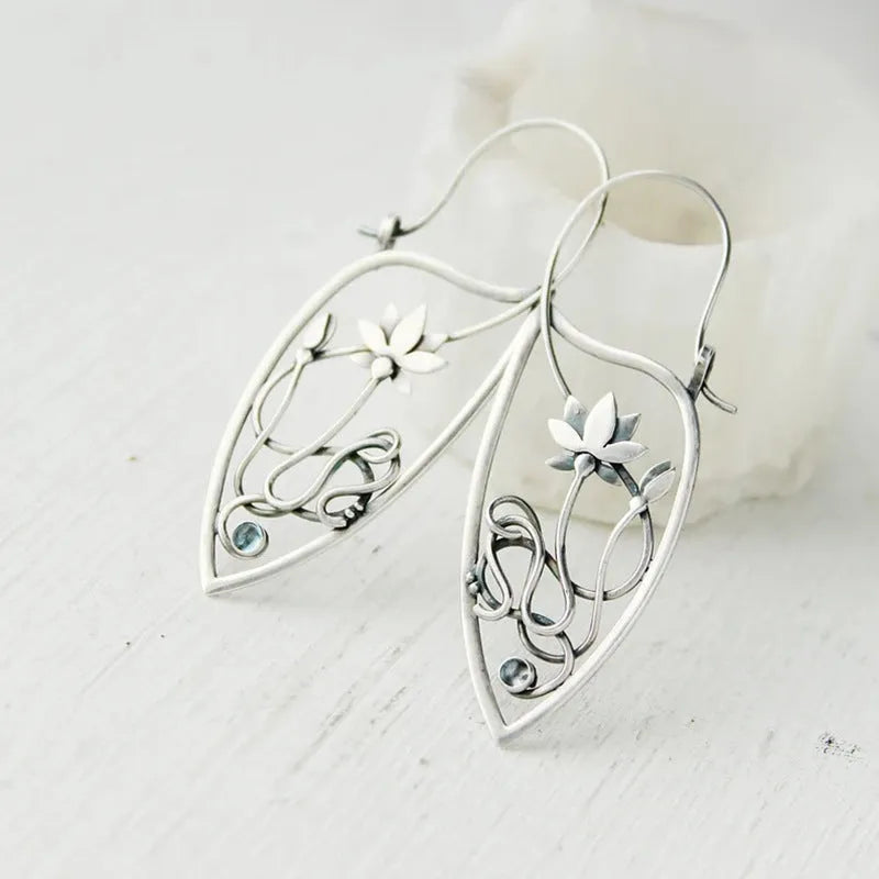 Silver electroplated alloy earrings with lotus vine geometric design and retro styling elements