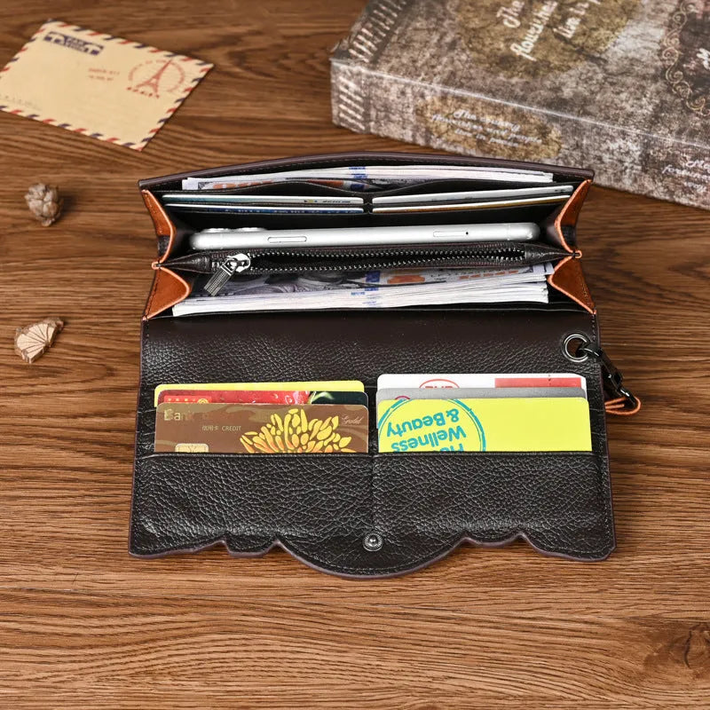 Chinese style embossed women's tri-fold wallet in genuine cowhide leather showing floral pattern detail