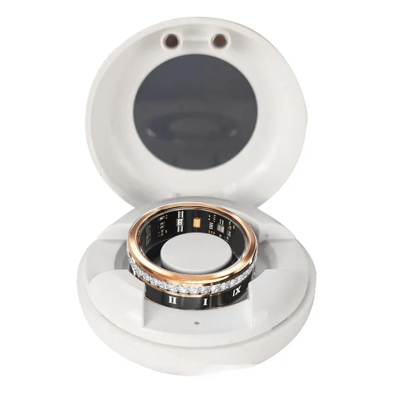 Gold and silver coloured smart ring with a diamond inlay on a finger, showing health tracking design.