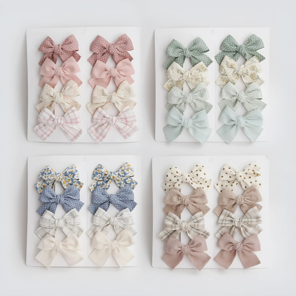 Children's fabric dovetail bow hair clips in eight pattern options