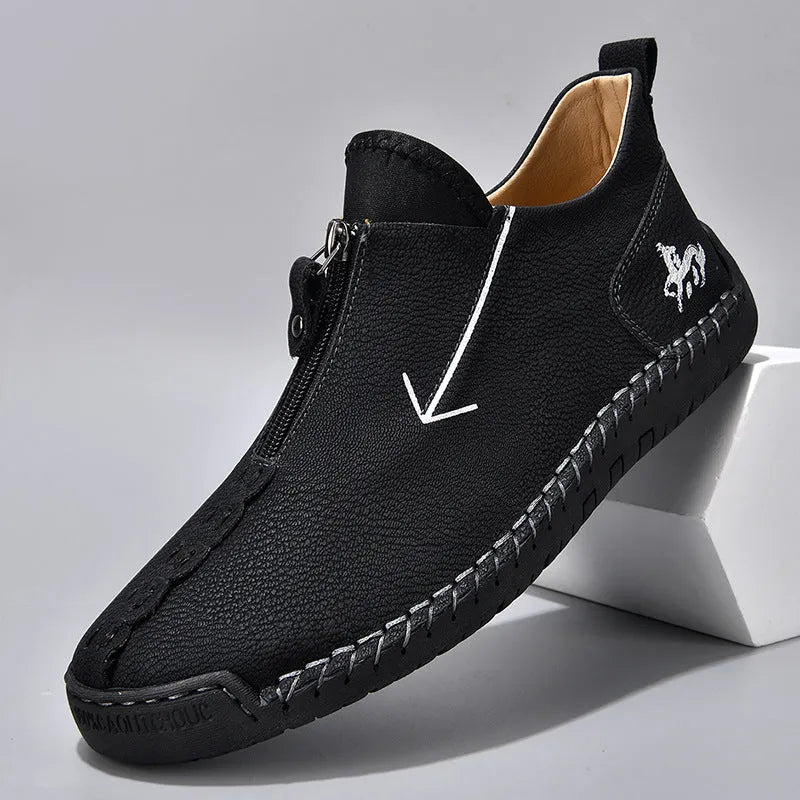 Men's brown leather-look zip-up martin boots with a round toe and rubber sole on a white background.