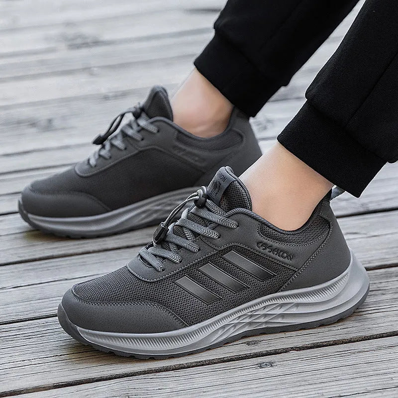 Breathable non-slip casual shoes with mesh upper and elastic band closure in black, dark grey, purple, and purplish red.