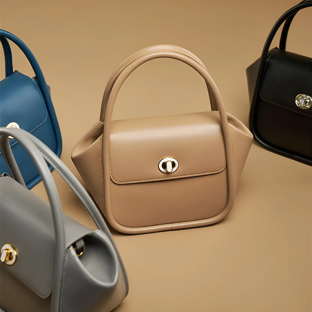 Leather wing-shaped tote cross-body bag in cow leather with single shoulder strap