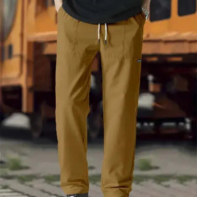 Men's straight-leg lightweight polyester trousers in light grey colour, laid flat showing front design