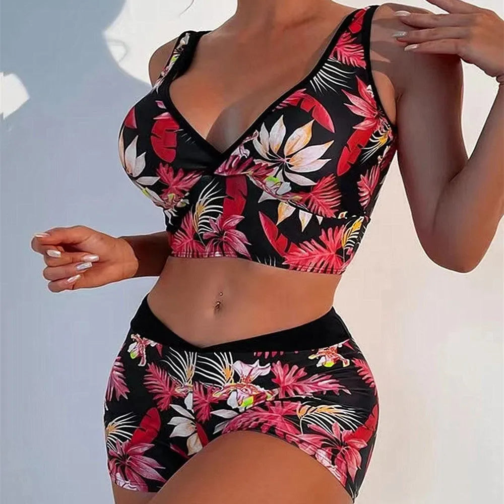 Women's two-piece swimsuit with sleeveless top and printed boxer shorts in multiple colours.
