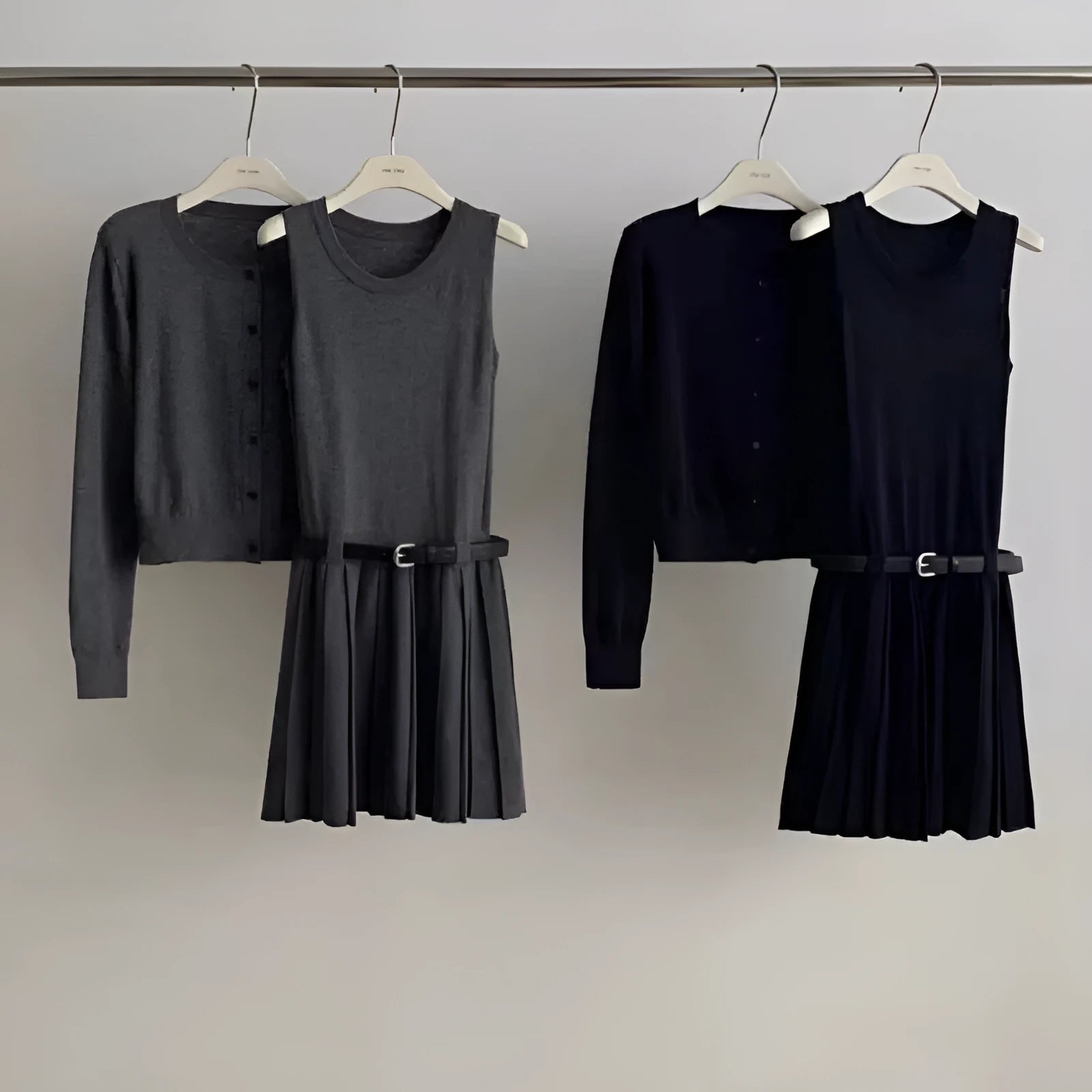 Women's grey Art Retro knitted vest skirt and long-sleeved cardigan set with pleating detail
