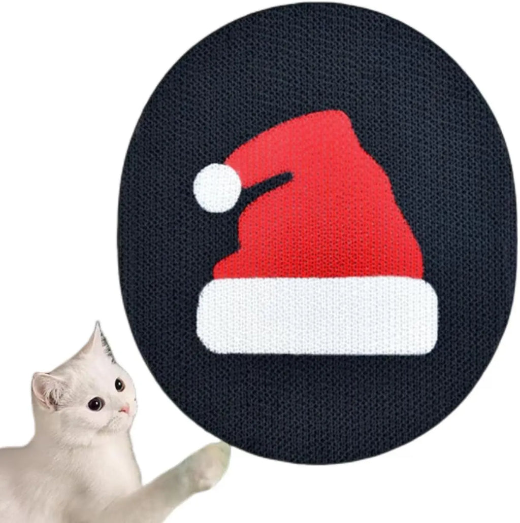 Vertical wall-mounted cardboard cat scratch pad with decorative print on wall