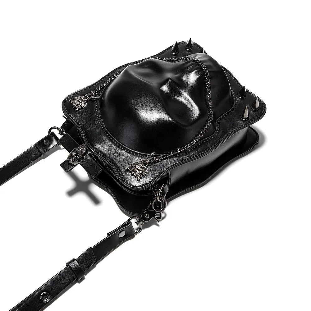 Black gothic skull mini crossbody bag with stitching and chain details