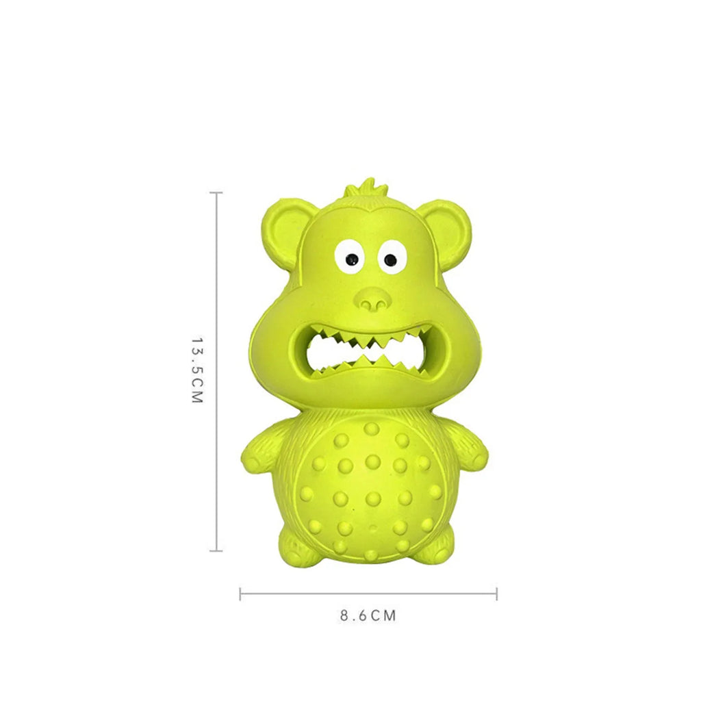 Green and yellow natural rubber dog chew toy for aggressive chewers, shown with a hollow centre for treats.
