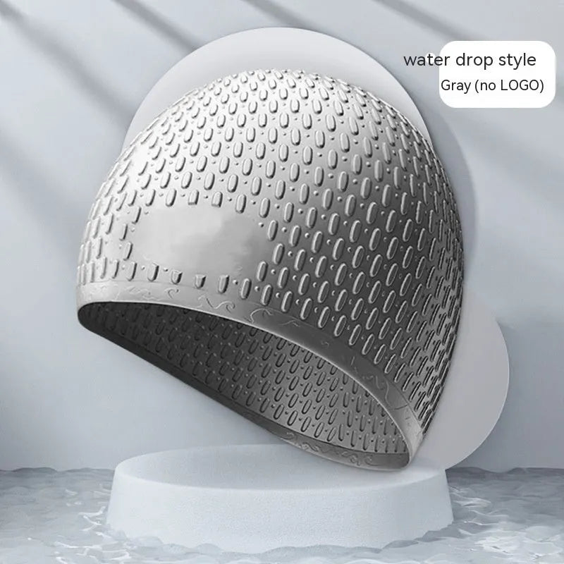 Silicone water drop design swimming cap for adults shown in various colours.