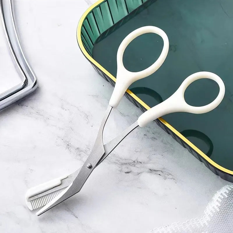 Curved moon-shaped eyebrow trimmer with a cutting comb on a white background.