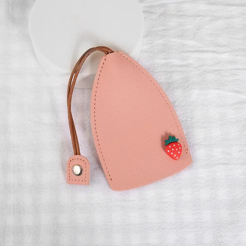 Cartoon pull-out key case in PU leather with colourful design, showing compact 14cm by 7.5cm dimensions