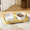 Ceramic elevated cat bowls with 15° tilted stand in green, white, and yellow colour options