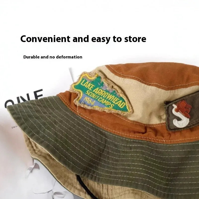 Army green foldable fisherman hat with flat top crown and patchwork cotton fabric design