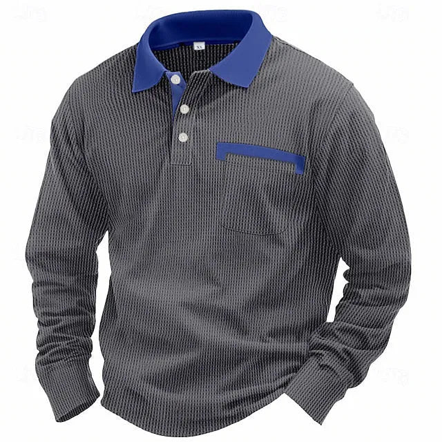 Man modelling a loose-fit long sleeve polo shirt with a waffle-texture fabric in a solid colour.