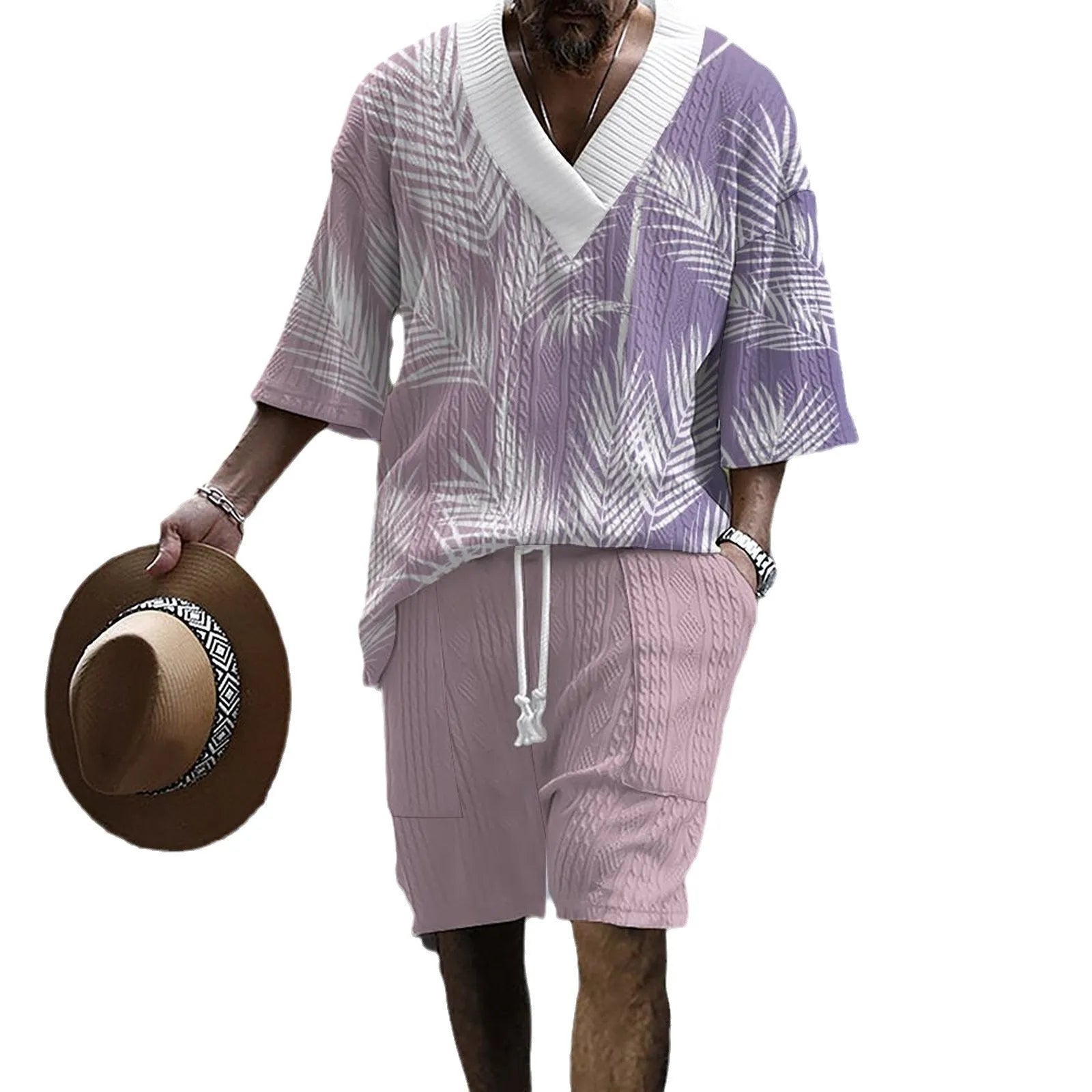 Men's knitted short-sleeved top and matching shorts in a solid colour, showing relaxed drop-shoulder fit.