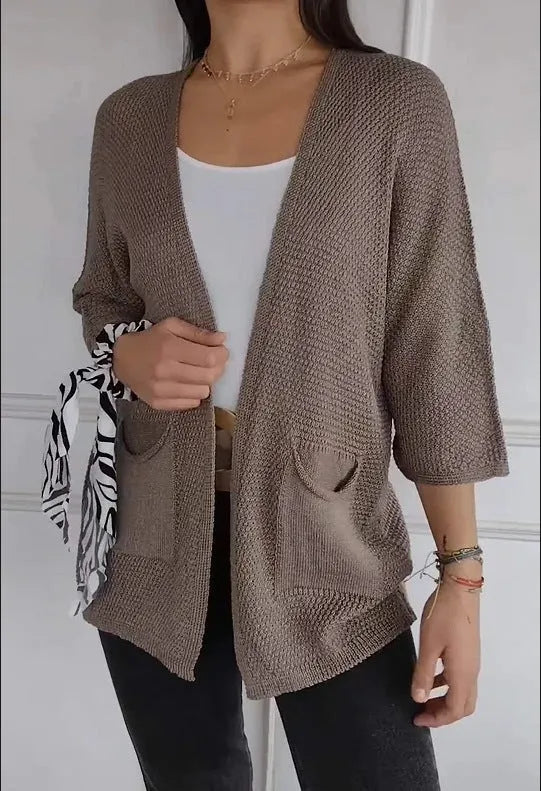 Women's waffle texture cardigan coat in army green with nine-quarter sleeves and pockets.
