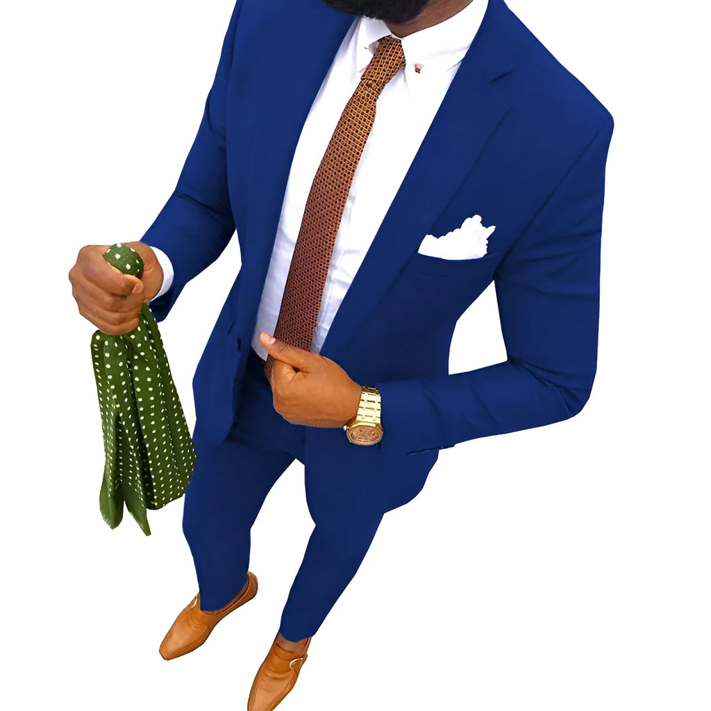 Man wearing a purple cotton two-piece suit jacket and trousers set.