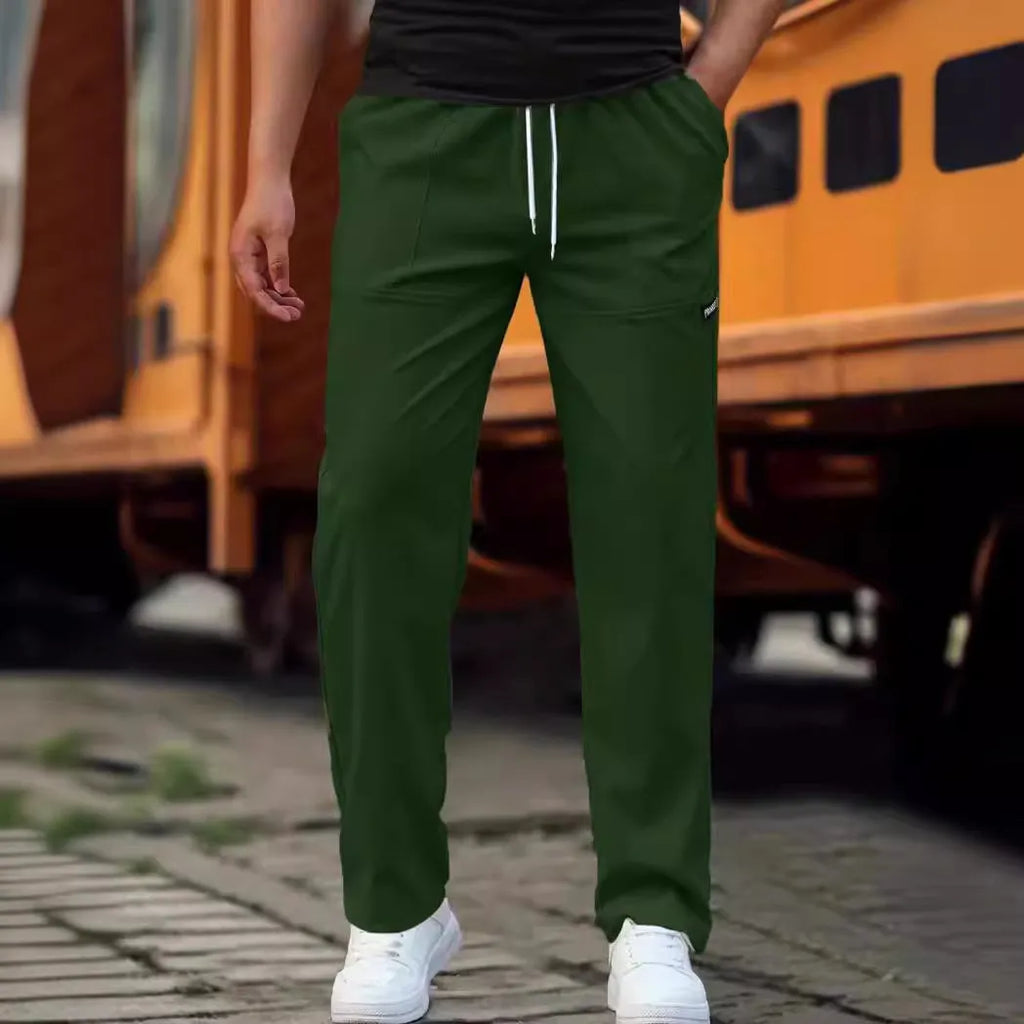 Men's straight-leg lightweight polyester trousers in light grey colour, laid flat showing front design