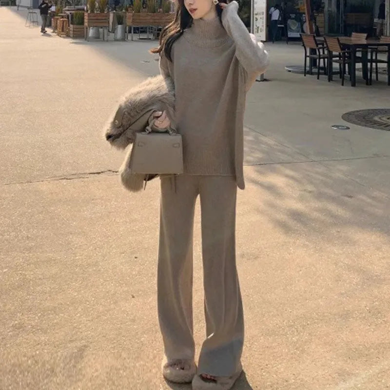 Women's casual acrylic fibre two-piece set with long-sleeve sweater and wide-leg trousers in solid colour.