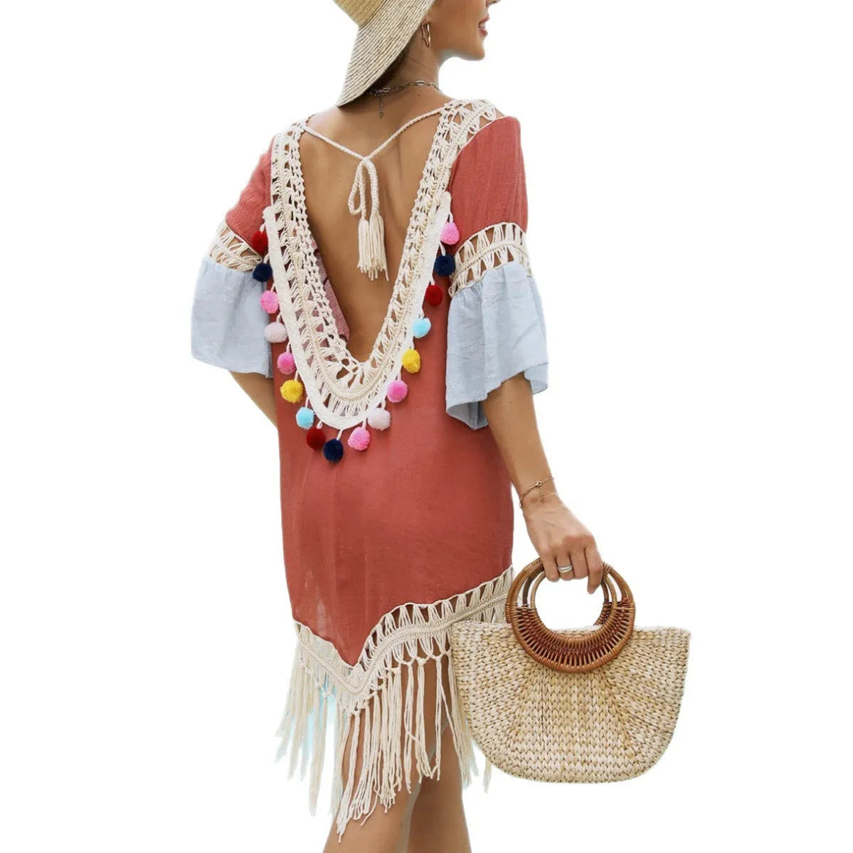 Orange floral pattern beach overskirt with hand crochet detail and bamboo cotton tassels.
