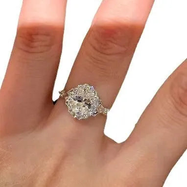 Silver geometric ring with diamond-shaped bridal bouquet pattern and adjustable opening