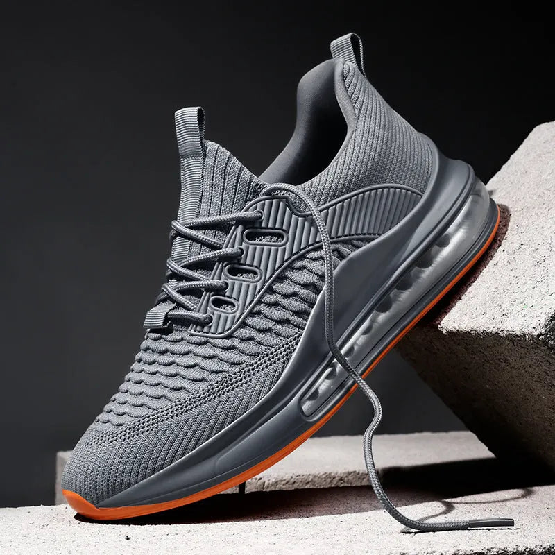 Men's low-top black mesh running shoes with lace-up front and rubber sole.