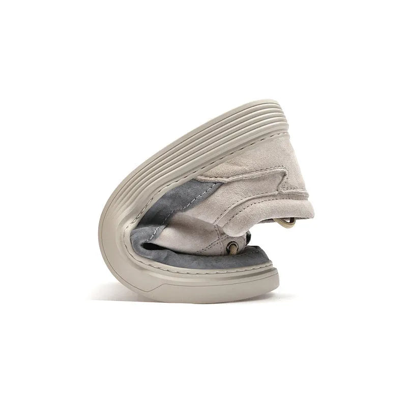 Men's grey and sand coloured low-top casual skate shoes with round toe and lace-up front.